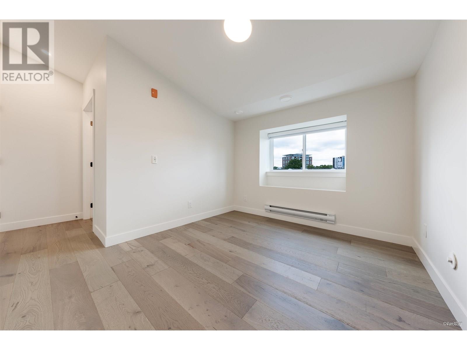 203 5092 SLOCAN STREET, Vancouver