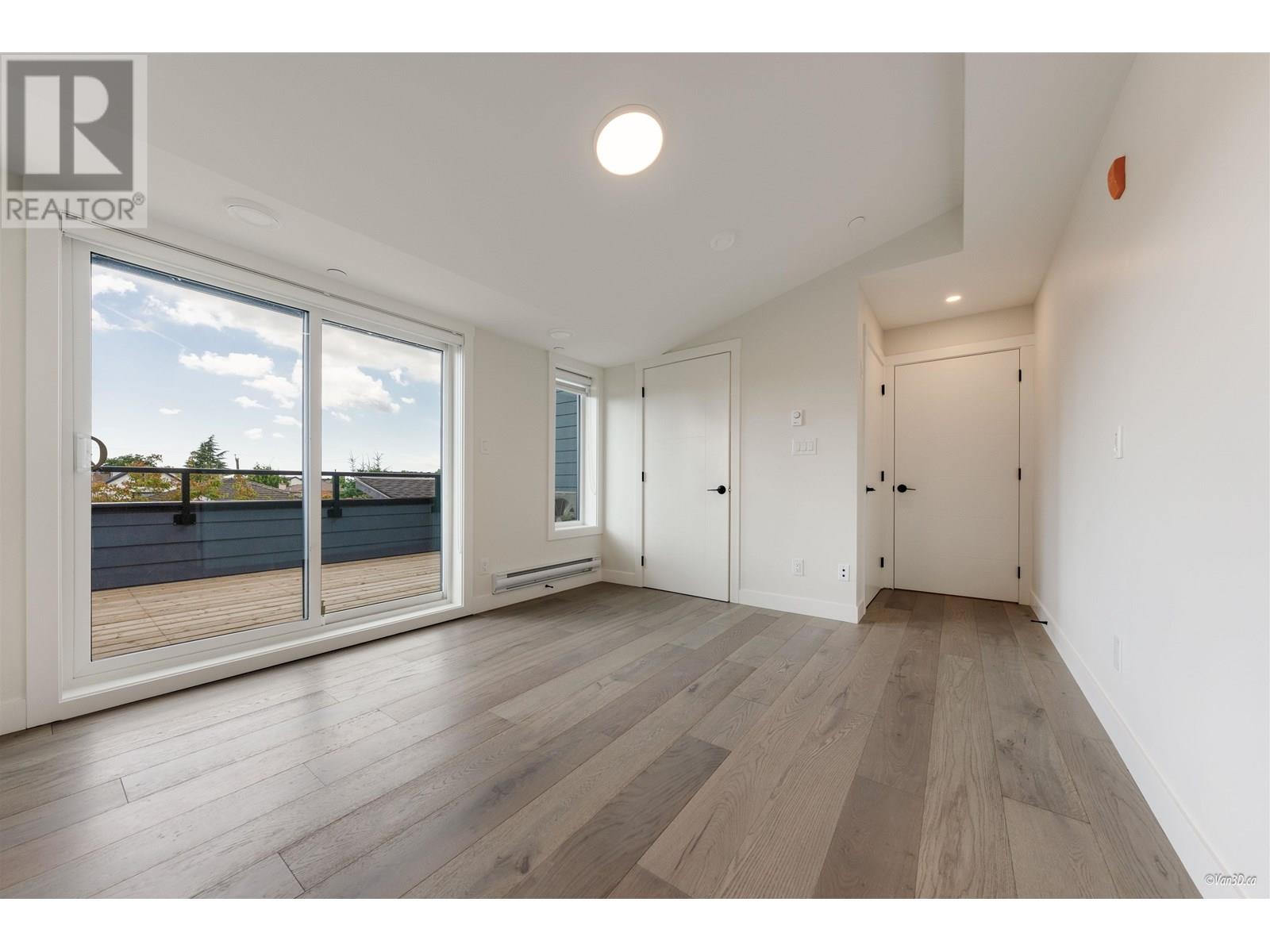 203 5092 SLOCAN STREET, Vancouver