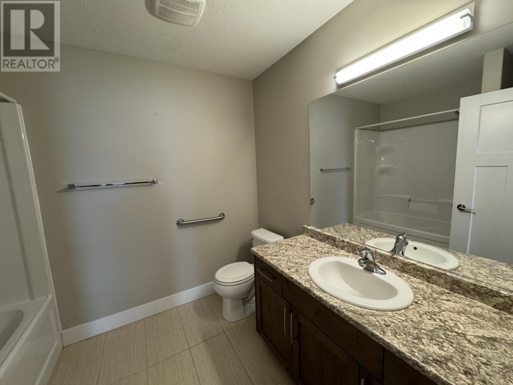 Photo 11 of 106 11205 105 Avenue, Fort St John BC