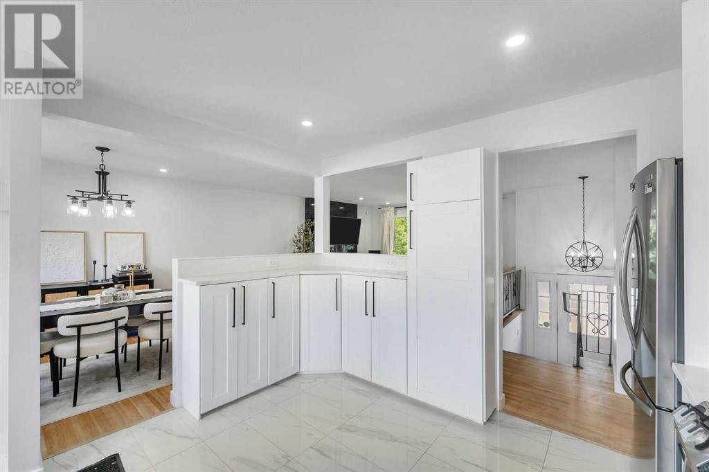 Single Family House Bi-level for Sale in  Hunterquay Way NW Huntington Hills Calgary 