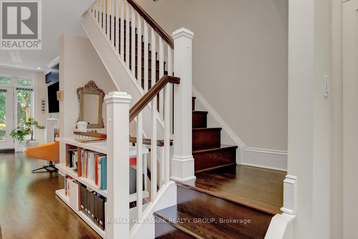 Hardwood stairs going to upper level