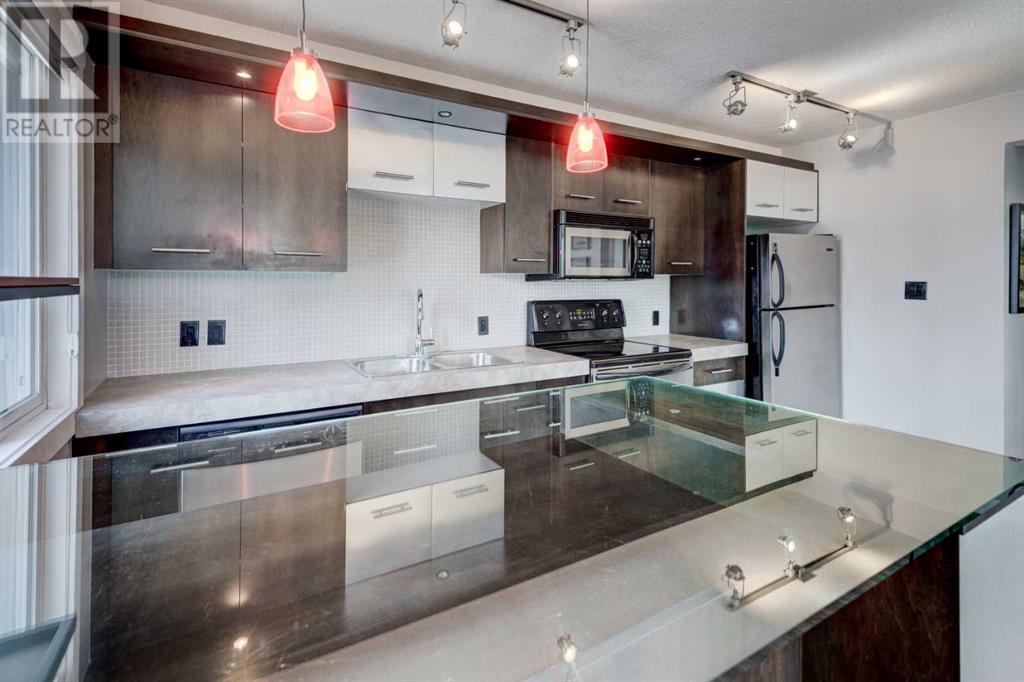 413, 324 22 AVENUE SW - Image 11