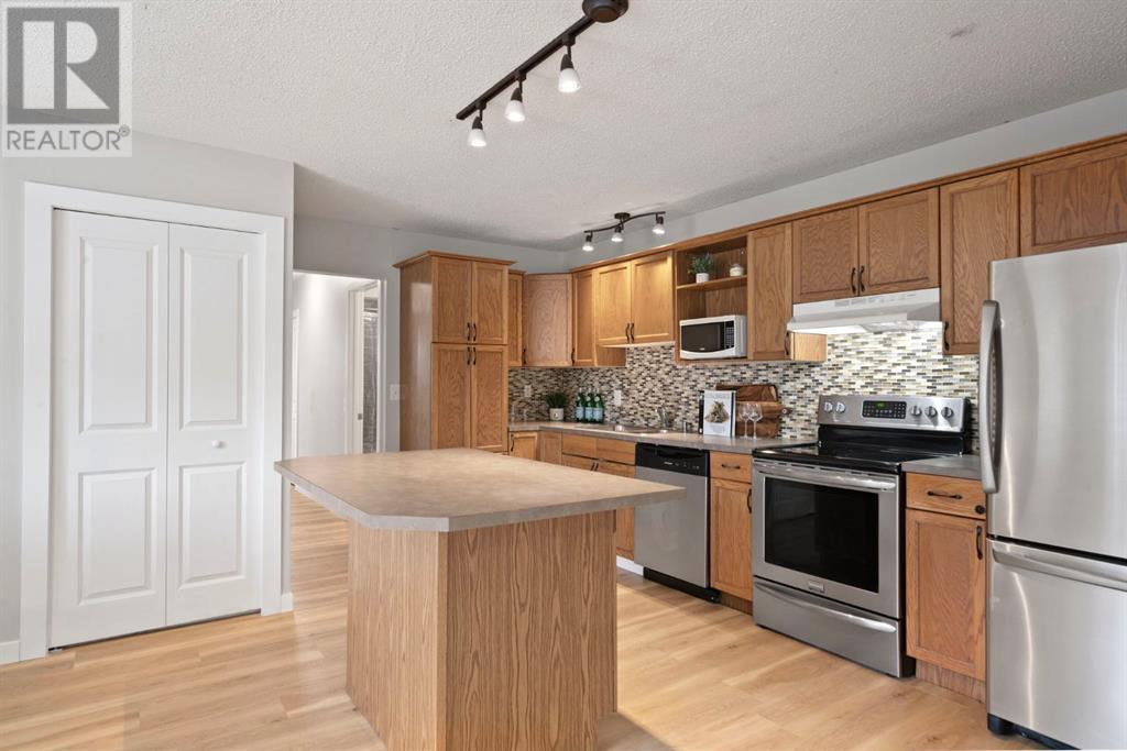 Single Family House Bungalow for Sale in  Midridge Gardens SE Midnapore Calgary 