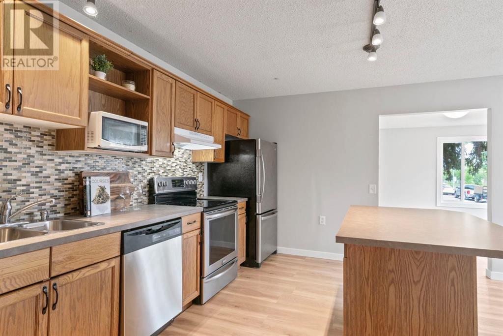Single Family House Bungalow for Sale in  Midridge Gardens SE Midnapore Calgary 