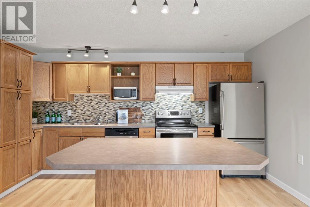 Single Family House Bungalow for Sale in  Midridge Gardens SE Midnapore Calgary 