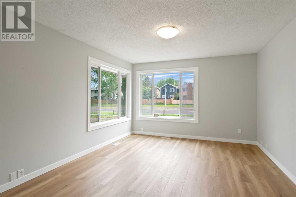 Single Family House Bungalow for Sale in  Midridge Gardens SE Midnapore Calgary 