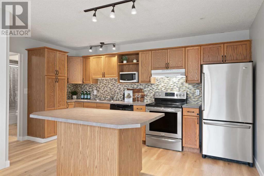 Single Family House Bungalow for Sale in  Midridge Gardens SE Midnapore Calgary 