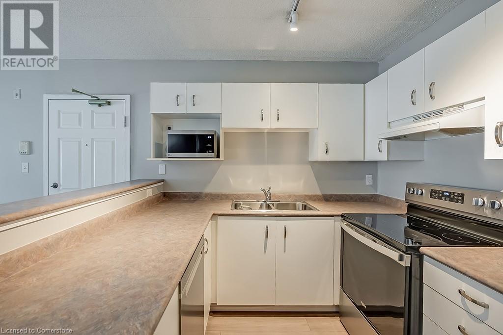 Photo 14 of 1441 Walkers Line Unit 110, Burlington ON