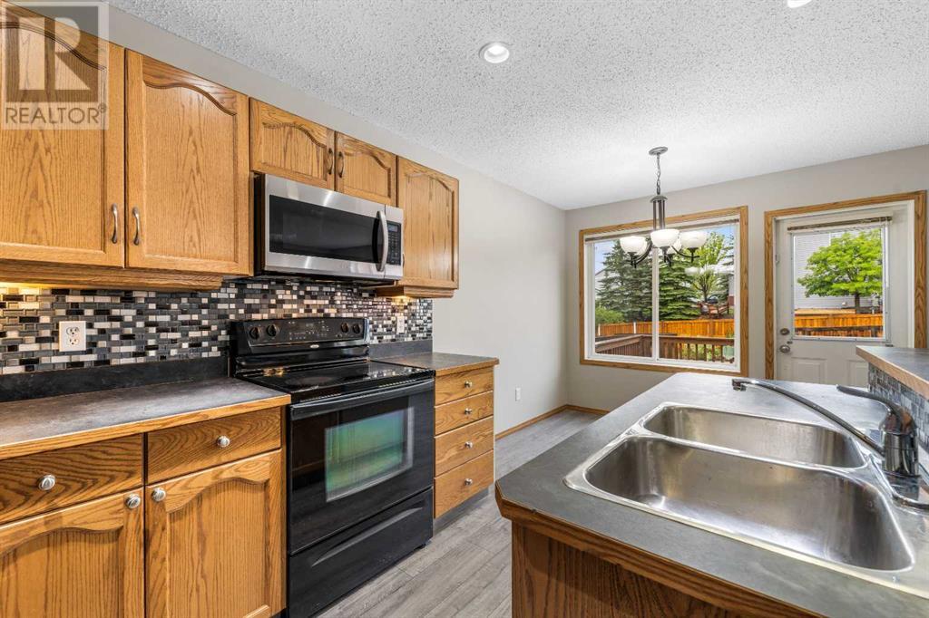 Single Family House for Sale in  Covebrook Close NE Coventry Hills Calgary 