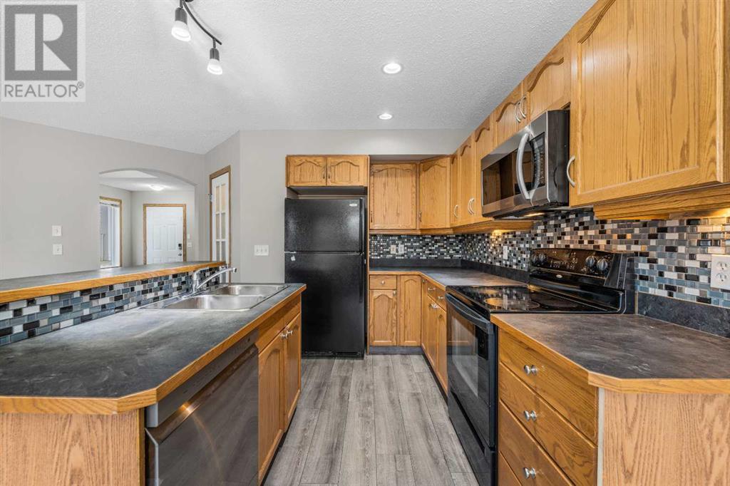 Single Family House for Sale in  Covebrook Close NE Coventry Hills Calgary 