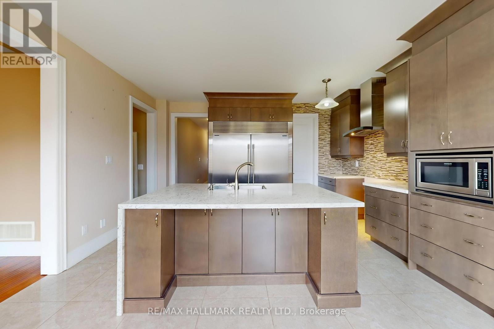 Photo 7 of 61 Mcisaac Drive, Springwater ON