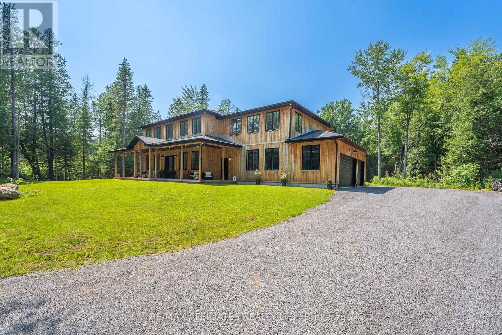 Long Driveway leads to your Oversized 3-Car Garage