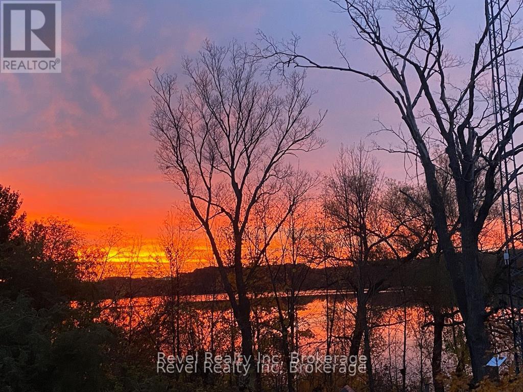 Photo 2 of 413 Russ Howard Drive, Midland ON
