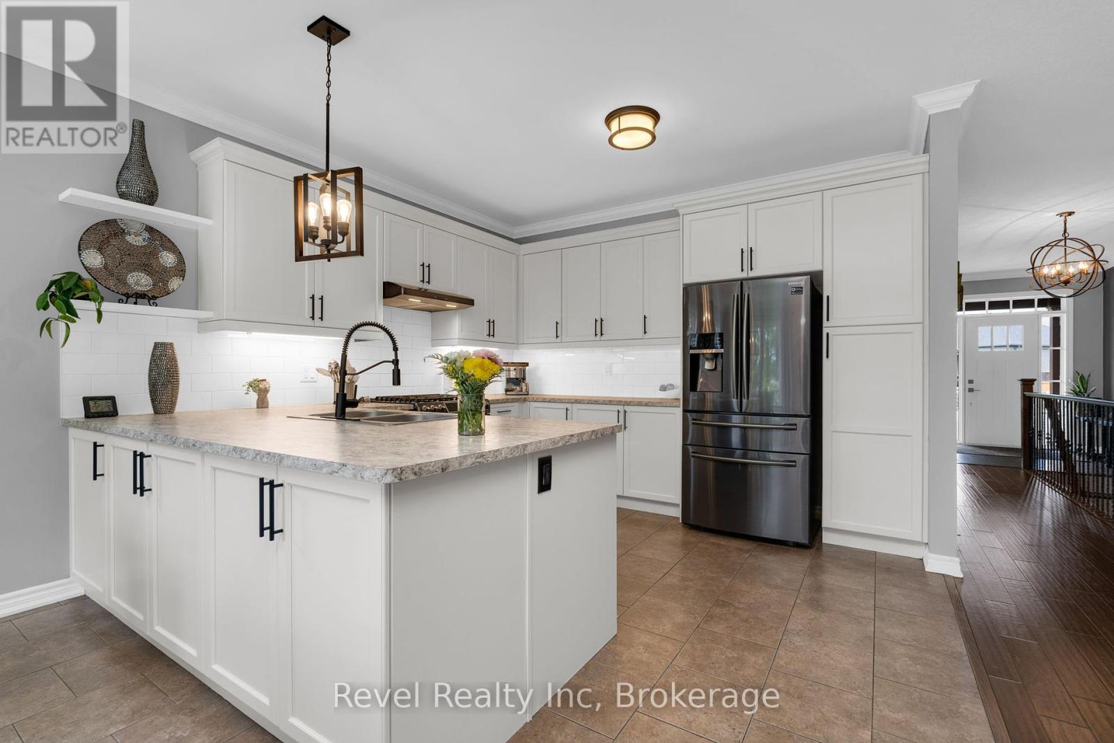 Photo 9 of 413 Russ Howard Drive, Midland ON