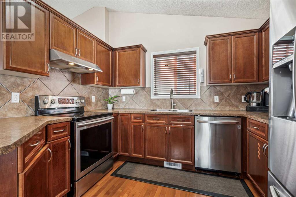 Single Family House Bi-level for Sale in  Covepark Place NE Coventry Hills Calgary 