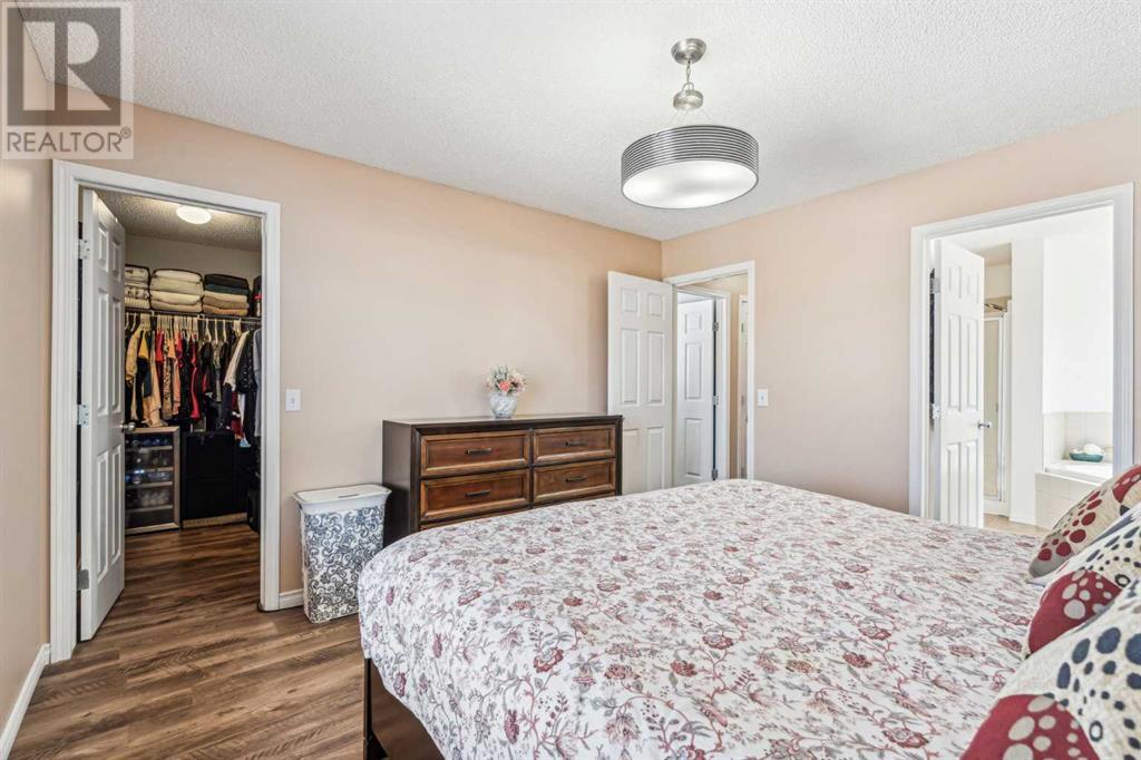 Single Family House Bi-level for Sale in  Covepark Place NE Coventry Hills Calgary 