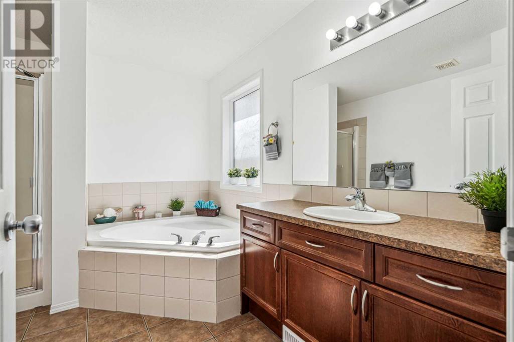 Single Family House Bi-level for Sale in  Covepark Place NE Coventry Hills Calgary 