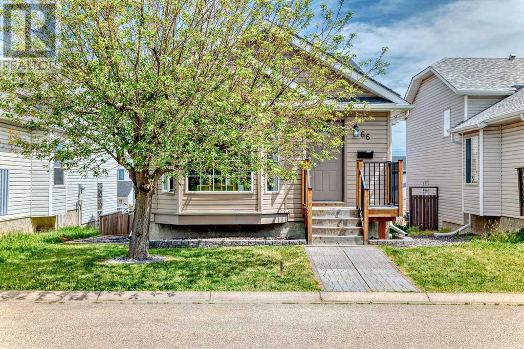 Single Family House 4 Level for Sale in  Millrise Mews SW Millrise Calgary 