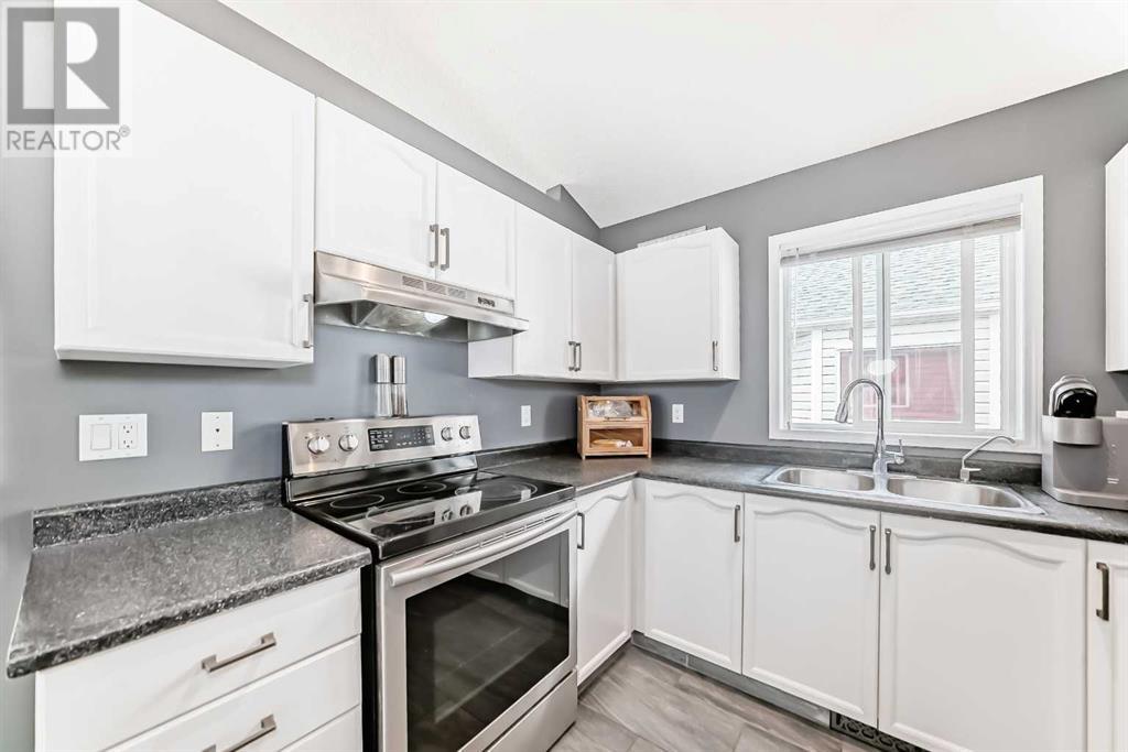 Single Family House 4 Level for Sale in  Millrise Mews SW Millrise Calgary 