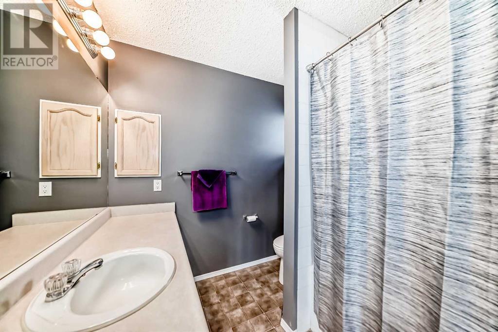 Single Family House 4 Level for Sale in  Millrise Mews SW Millrise Calgary 