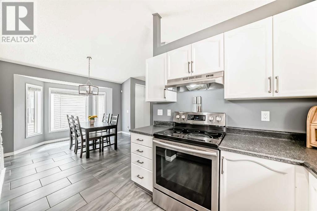 Single Family House 4 Level for Sale in  Millrise Mews SW Millrise Calgary 