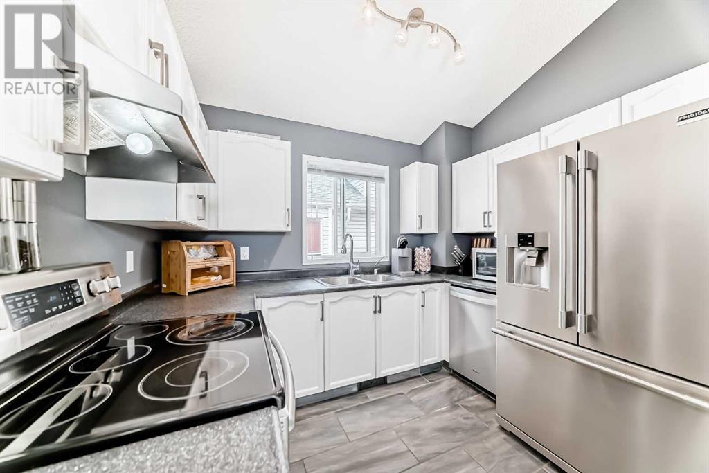 Single Family House 4 Level for Sale in  Millrise Mews SW Millrise Calgary 
