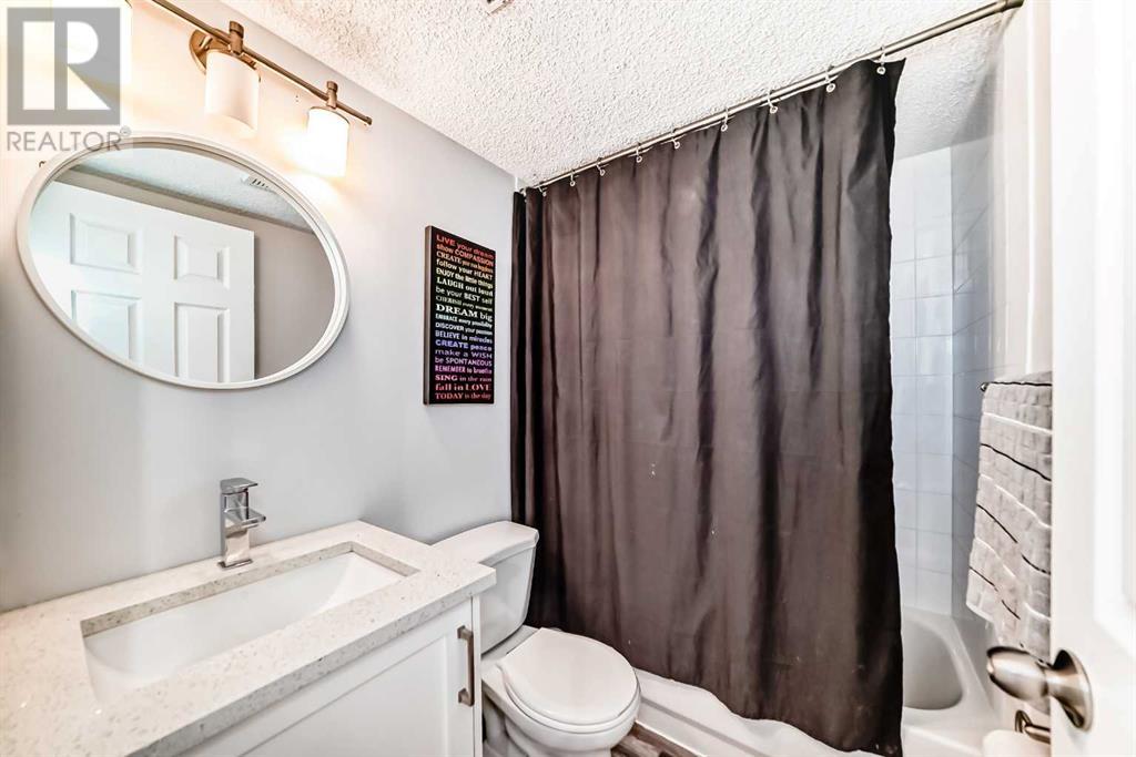 Single Family House 4 Level for Sale in  Millrise Mews SW Millrise Calgary 