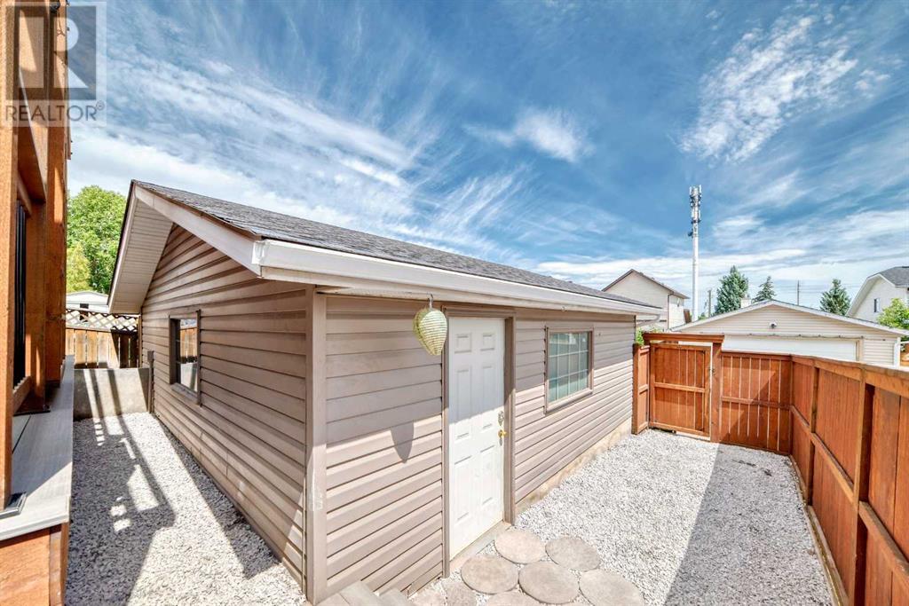 Single Family House 4 Level for Sale in  Millrise Mews SW Millrise Calgary 