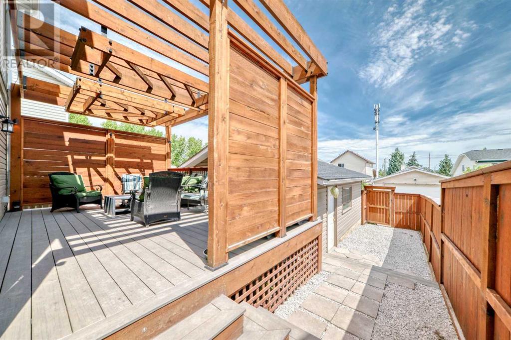 Single Family House 4 Level for Sale in  Millrise Mews SW Millrise Calgary 