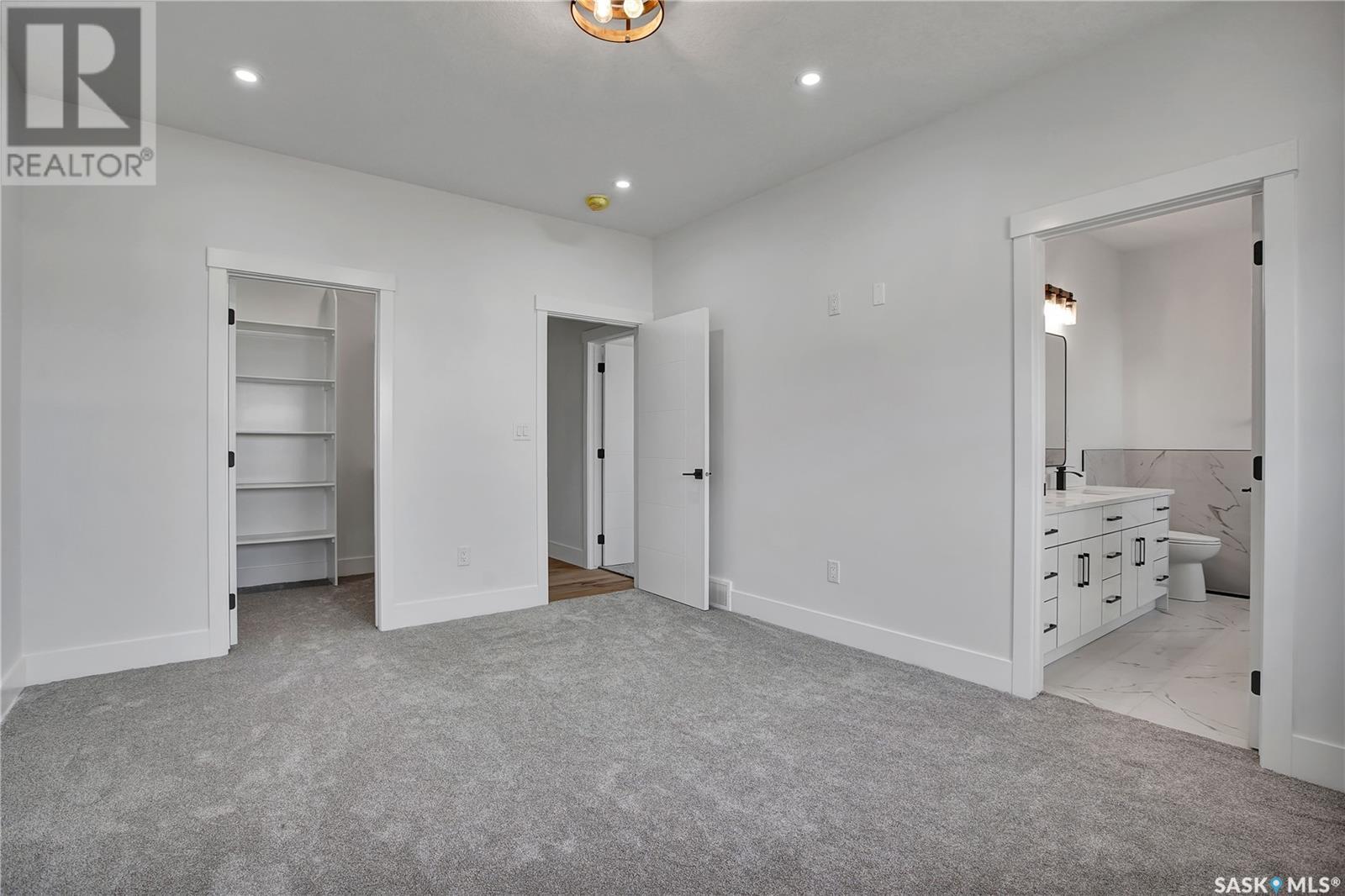 Photo 20 of 812 Woods Crescent, Warman SK