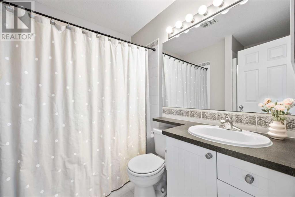 Single Family House for Sale in  Simcoe Place SW Signal Hill Calgary 
