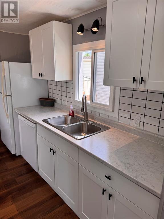 Single Family House Mobile Home for Sale in    Avenue SE Red Carpet Calgary 