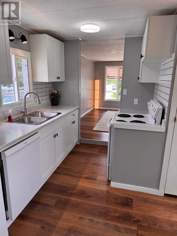 Single Family House Mobile Home for Sale in    Avenue SE Red Carpet Calgary 
