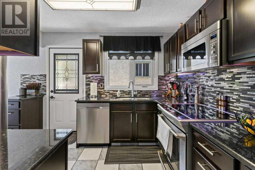 Single Family House 4 Level for Sale in  Beacham Rise NW Beddington Heights Calgary 