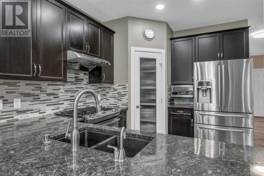 Single Family House for Sale in  Everhollow Green SW Evergreen Calgary 