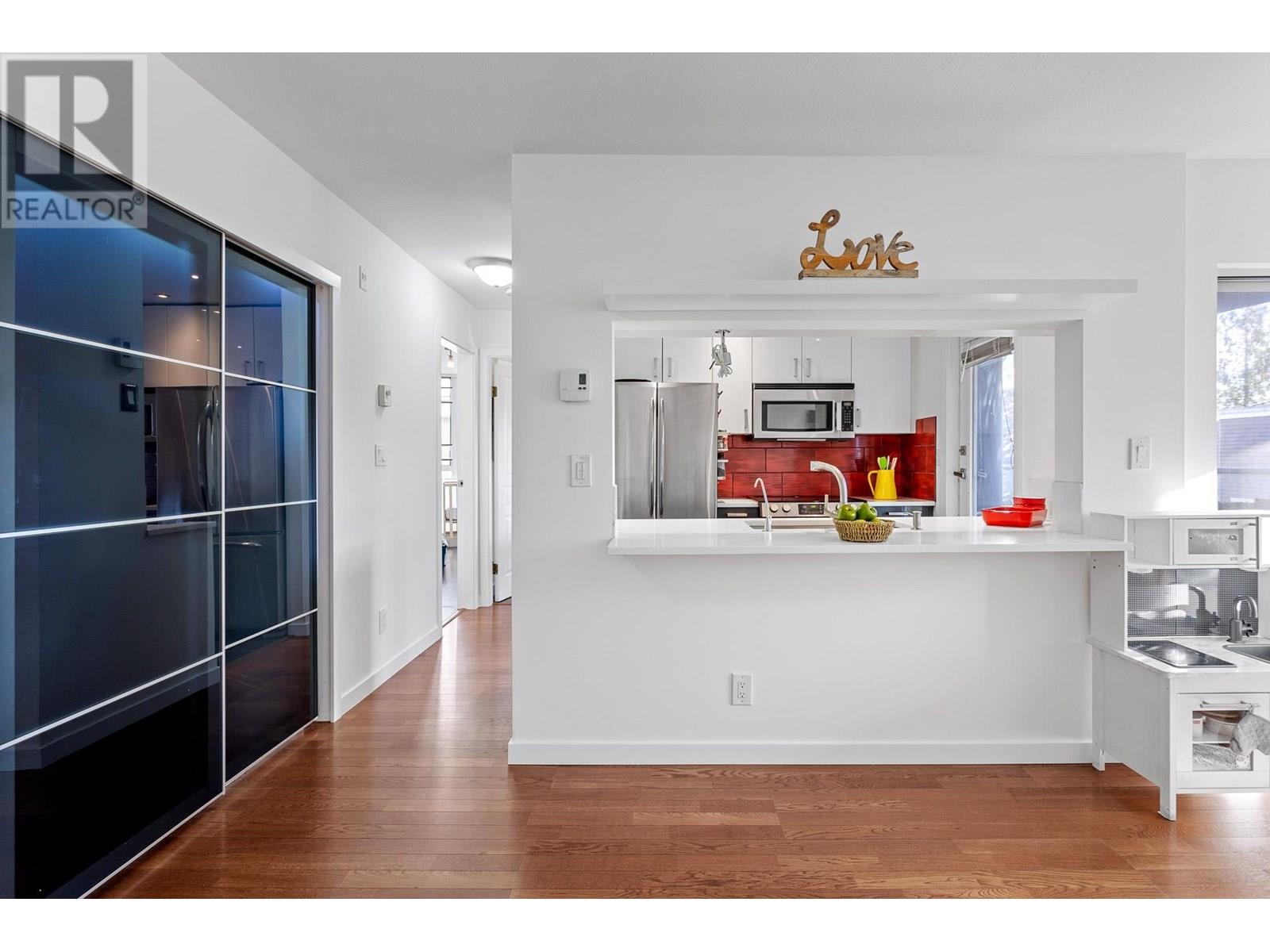 Photo 11 of 212 8460 Jellicoe Street, Vancouver BC
