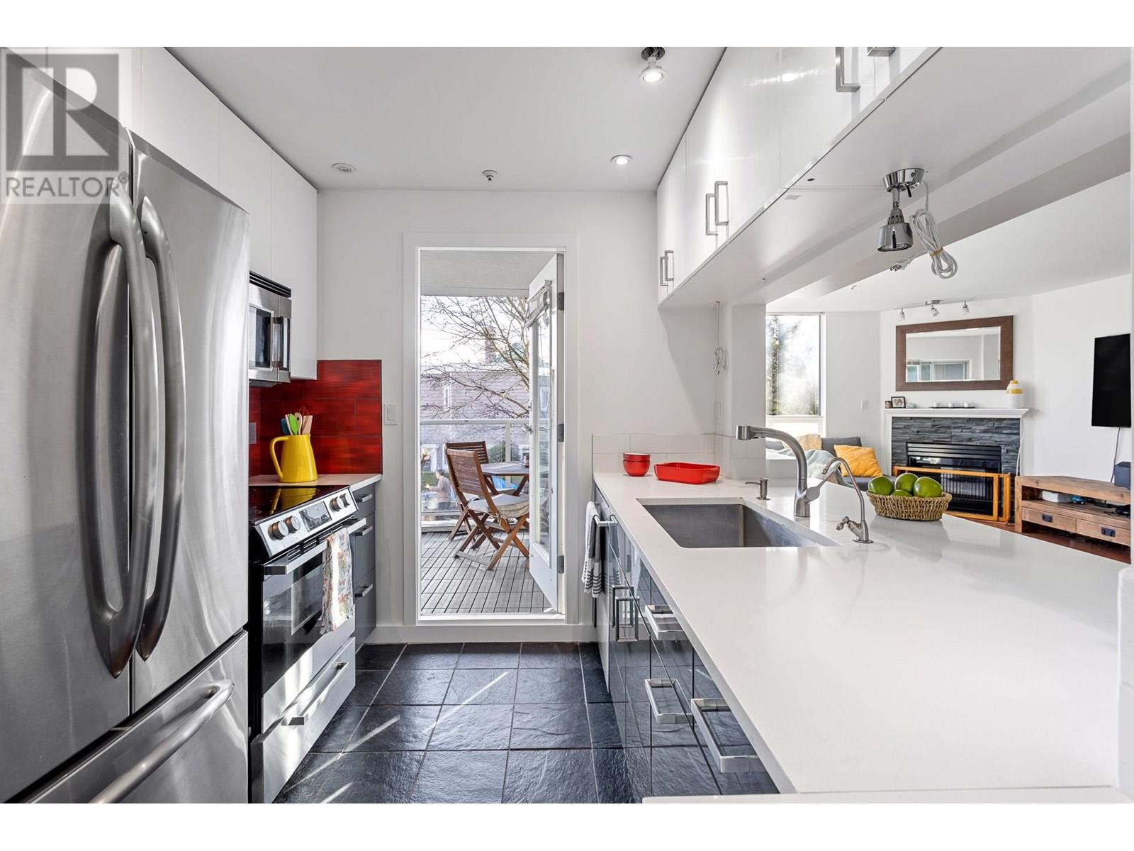 Photo 14 of 212 8460 Jellicoe Street, Vancouver BC