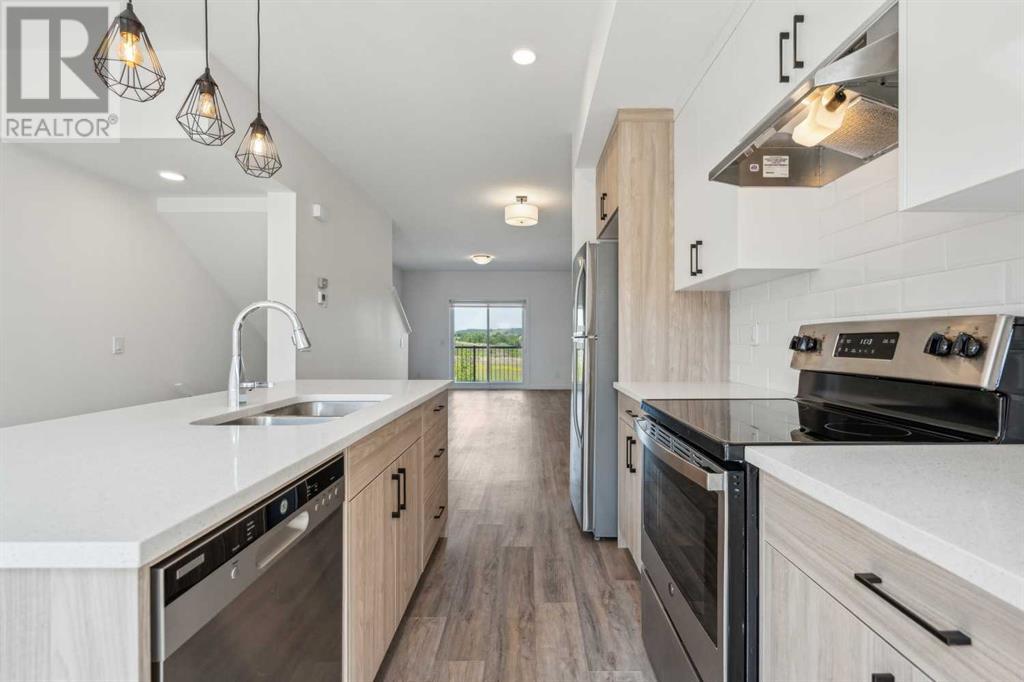 Photo 10 of 202 24 Rivercrest Drive, Cochrane AB