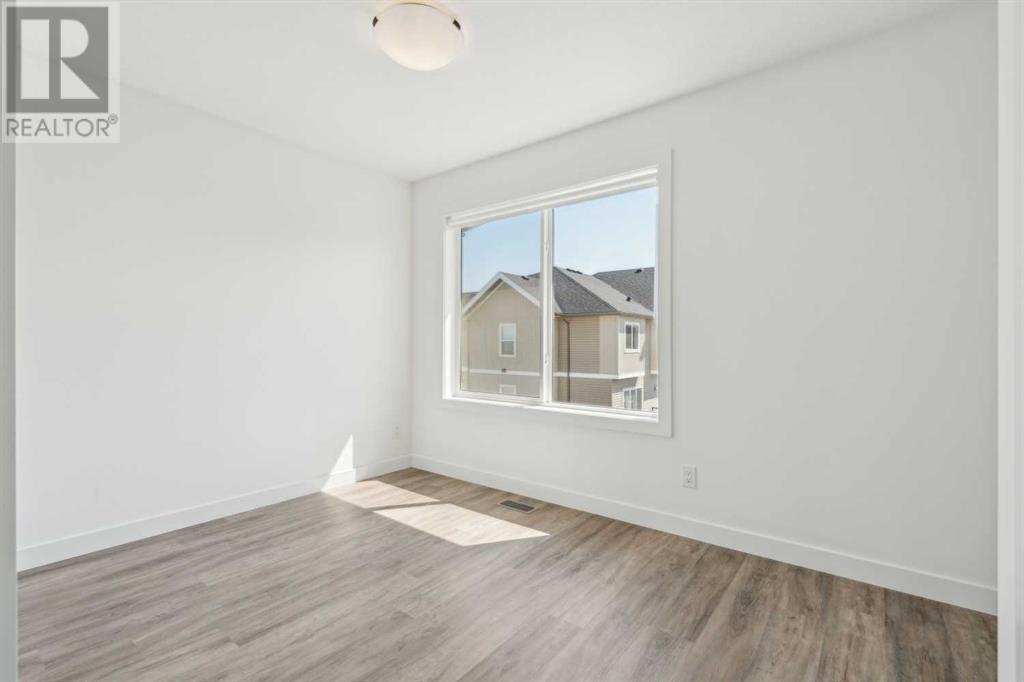 Photo 22 of 202 24 Rivercrest Drive, Cochrane AB