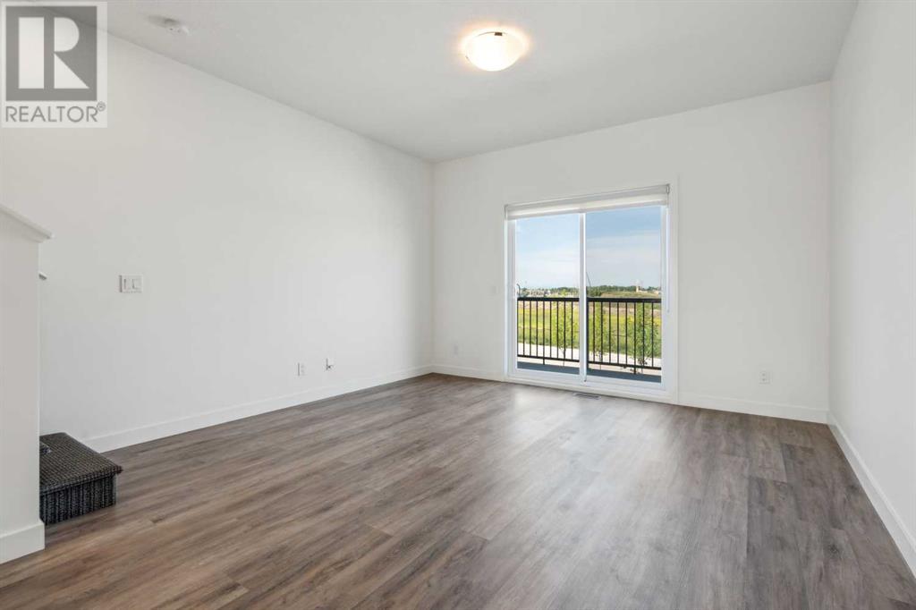 Photo 17 of 202 24 Rivercrest Drive, Cochrane AB