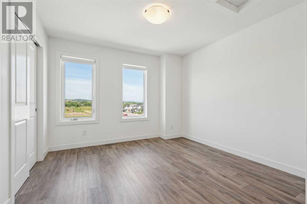 Photo 19 of 202 24 Rivercrest Drive, Cochrane AB