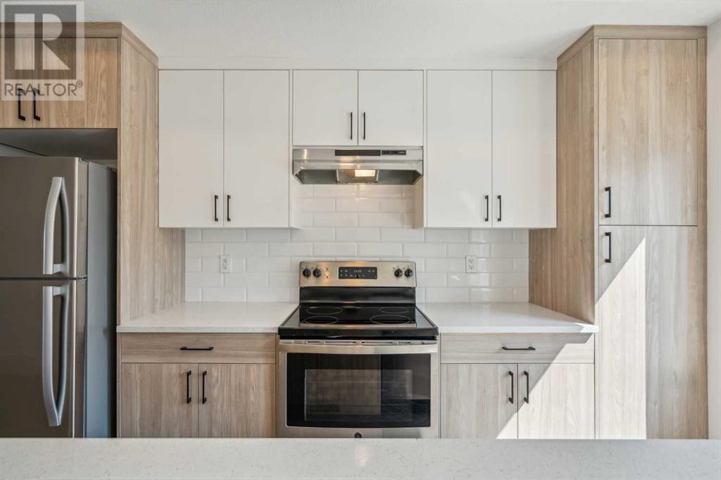 Photo 11 of 202 24 Rivercrest Drive, Cochrane AB