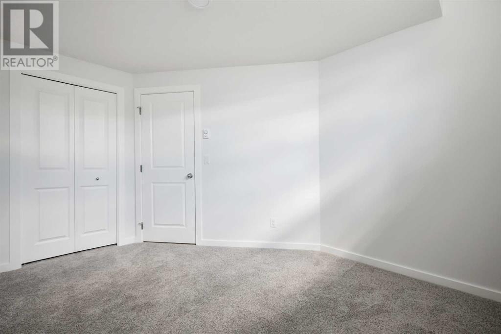Single Family House for Sale in  Belmont Way SW Belmont Calgary 