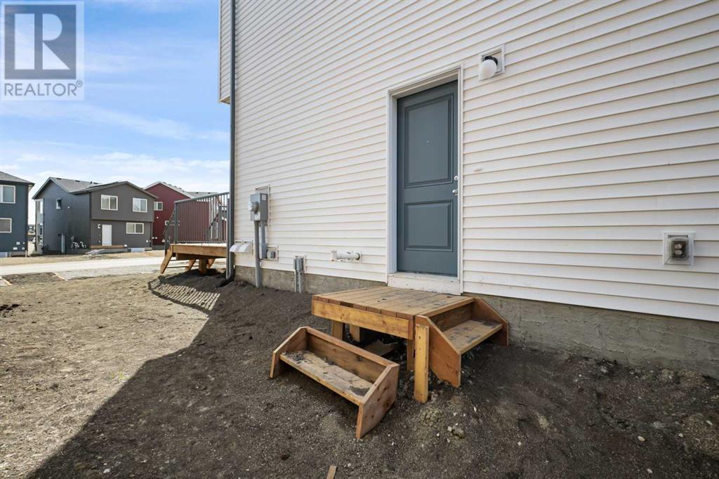 Single Family House for Sale in  Belmont Way SW Belmont Calgary 