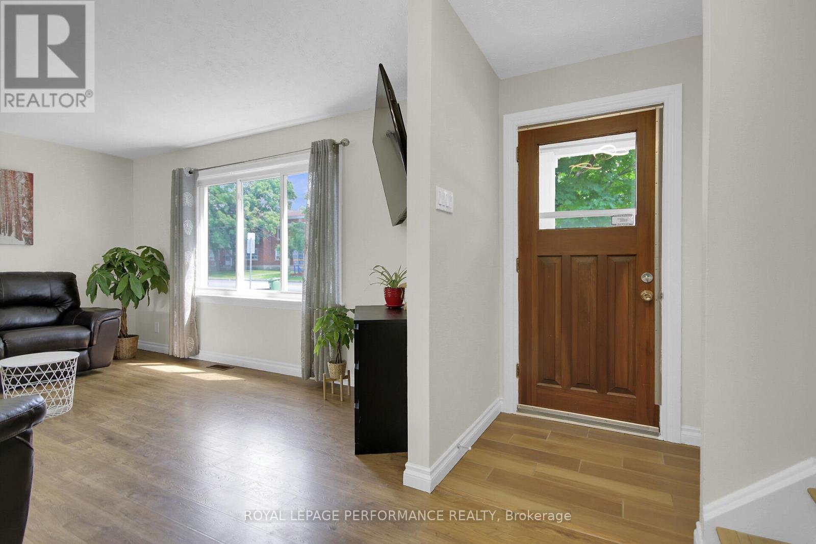 Step into a warm and inviting front foyer