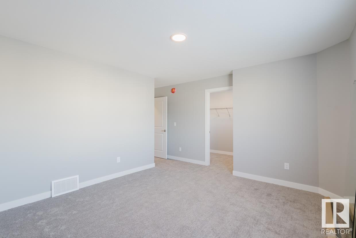 Photo 8 of 5418 69 St, Beaumont AB