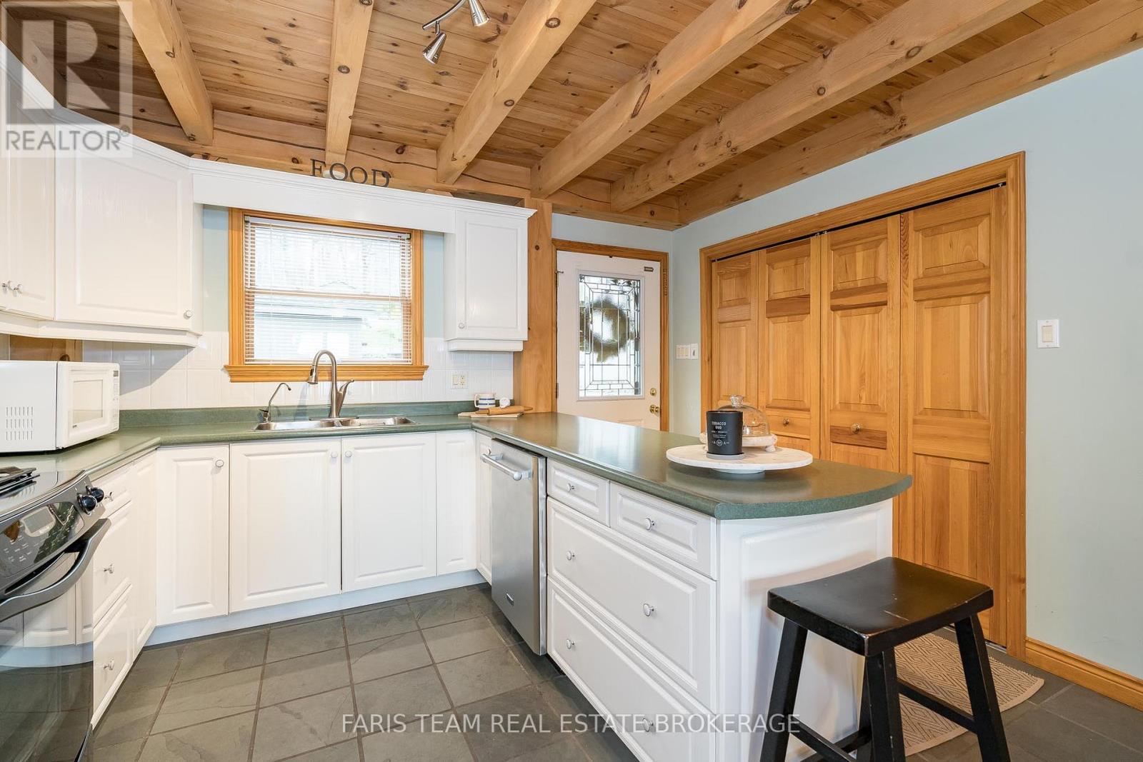 Photo 3 of 431 Mundys Bay Road, Midland ON