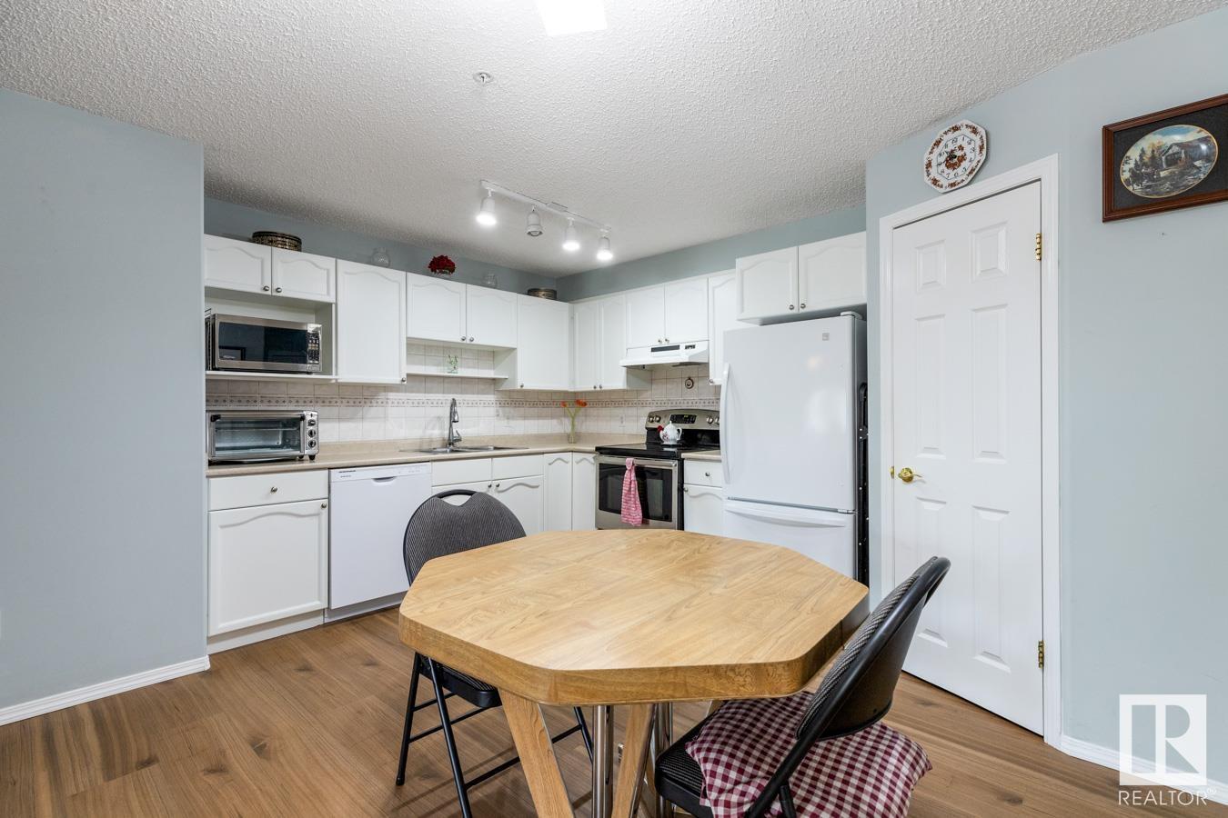 Photo 7 of 301 5116 49 Av, Leduc AB