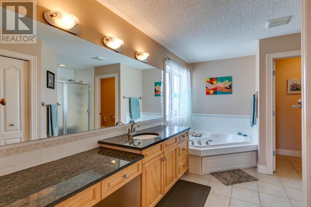 Single Family House for Sale in  Evergreen Drive SW Evergreen Calgary 