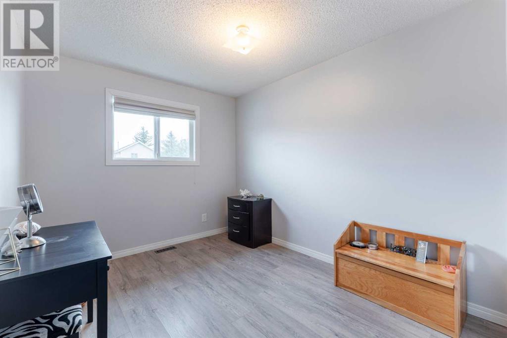 Single Family House 3 Level for Sale in  Laguna Close NE Monterey Park Calgary 